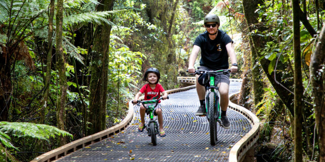 Bikers on Kawatiri Coastal Trail boardwalk