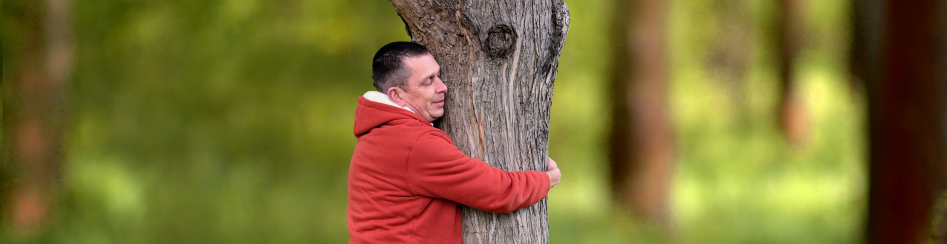 Matt hugging tree