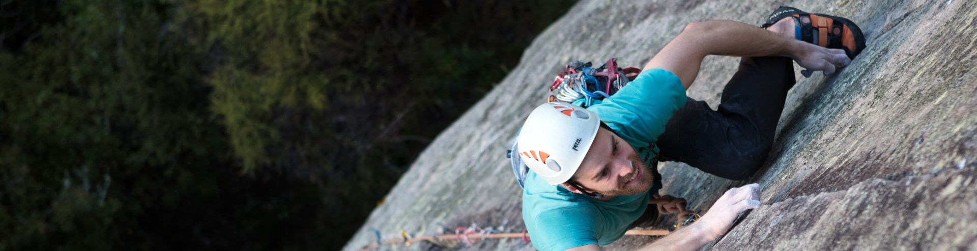 Edwin Sheppard climbing Badlands, Whanganui Bay 